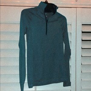 Long sleeve blue quarter zip pullover with thumbs